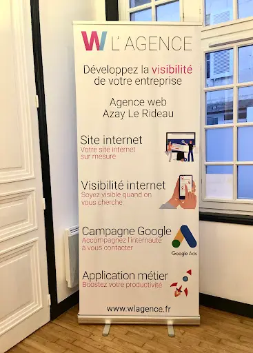 W l'Agence